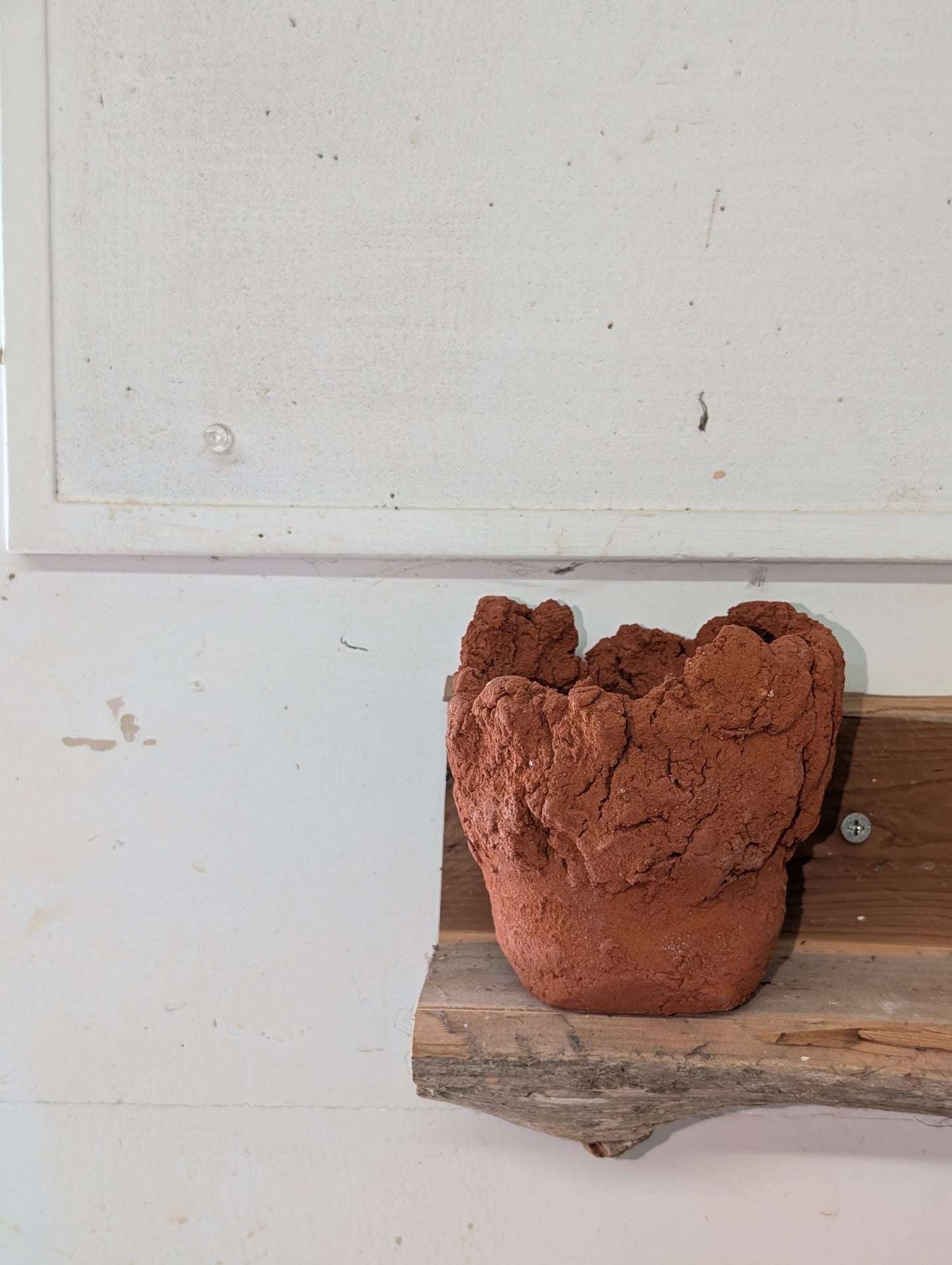 Piece 1,695 – Wild Red Clay Vessel with Cratered Crest