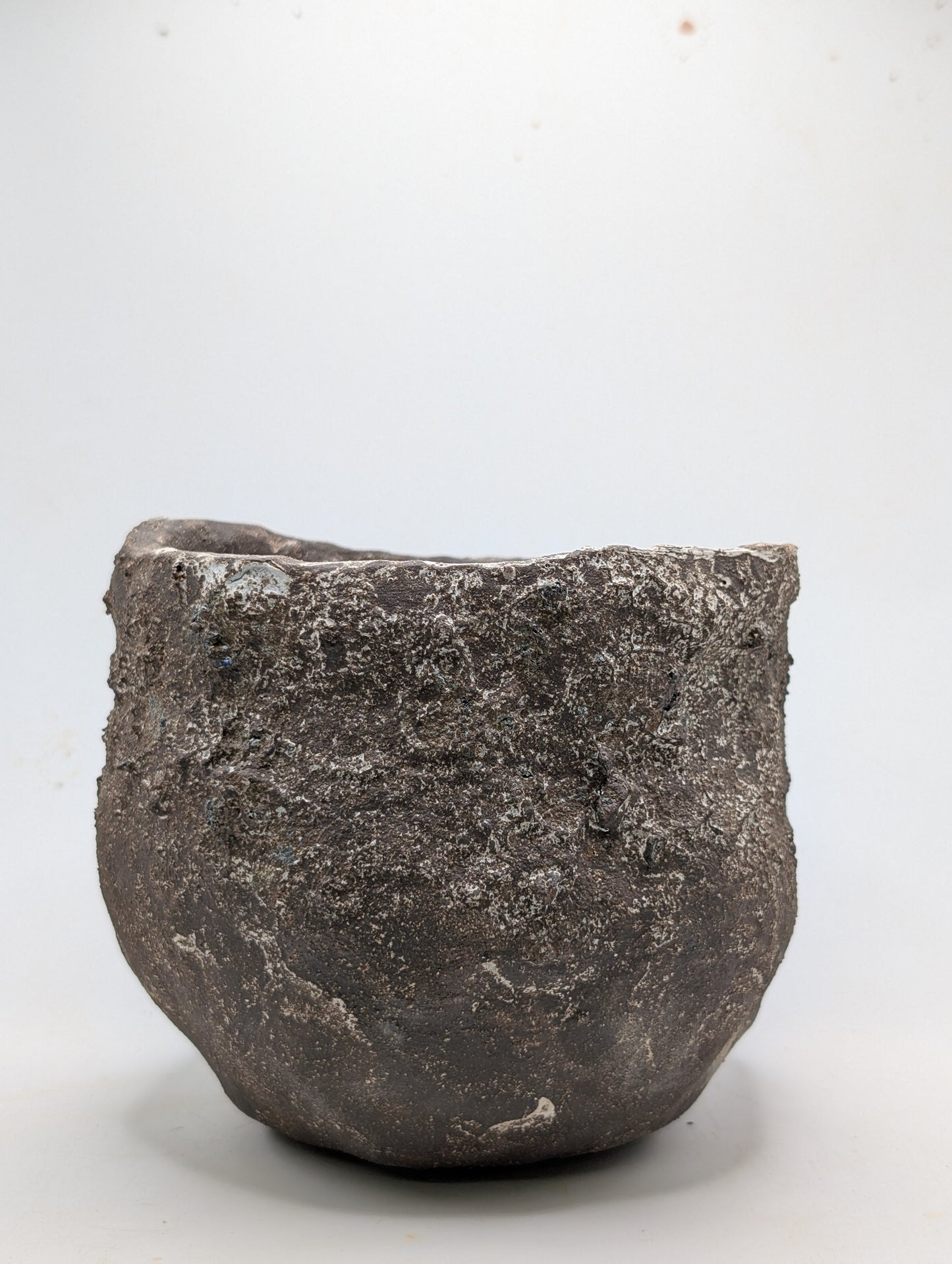 Ceramic Piece 1748: Handbuilt Black Clay Vessel – Glaze-Washed Sculptural Form with Mineral Texture