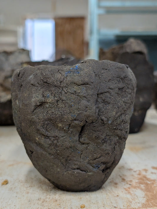 Handbuilt Black Clay Vessel – Sculptural Form with Blue Glaze Inclusions: Ceramic Piece 1751